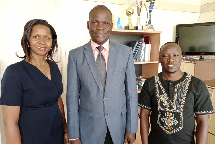 Chair, Department of Journalism and Mass Communication (DoJMC), University of Nairobi Dr. Silas ORIASO (centre) sharing a light moment with Dr. Fred Kakooza (Right) and Dr. Marion Alina (Left) from the Department of Journalism and Mass Communication, Makarere University, Uganda.